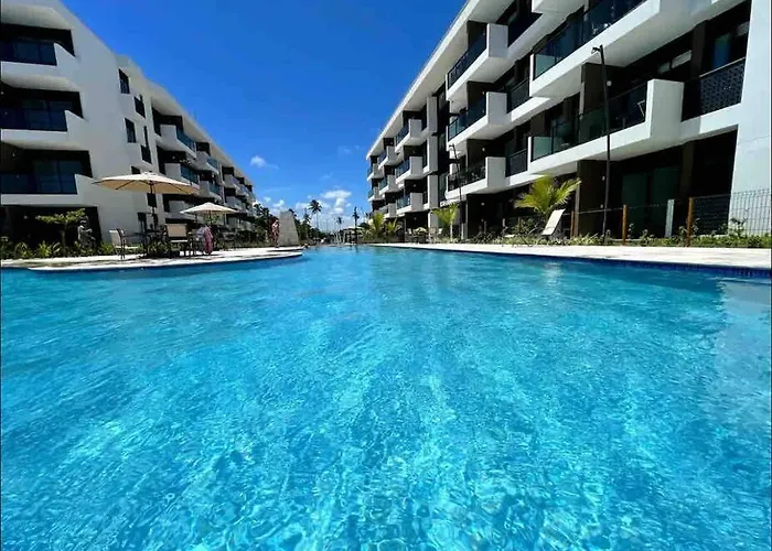 Flat em Muro Alto Porto de Galinhas com Piscina, Ar-condicionado e Cozinha Equipada